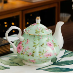 Blumenteekanne aus Keramik mit 900 ml — Rosa Blumen, mintgrüner Grund