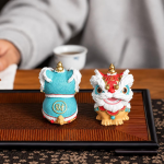 Chinesische Löwenfiguren aus Kunstharz im Duo