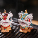 Chinesisches Löwentanz-Teetier aus Kunstharz