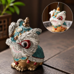 Chinesisches Löwentanz-Teetier aus Kunstharz — Türkis
