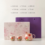 Chinesisches Tee-Set aus Keramik mit Pfirsichmotiv — Fußlose Tassen mit Geschenkbox
