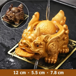 Farbwechselndes Teetier aus Kunstharz — Goldene Kreatur