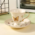 Florales Teeservice aus Keramik mit Golddekor — Tasse mit Untertasse