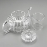 Glas-Teeservice in Kürbisform mit Stövchen