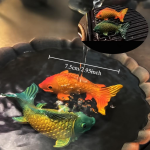 Koi-Teetier aus Kunstharz mit Farbwechsel — Orange-türkisgrünes Duo