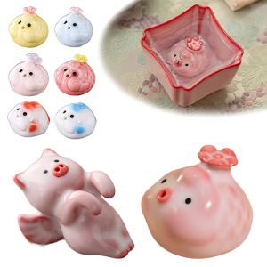 Schwein als Keramik-Teetier mit blauen Akzenten