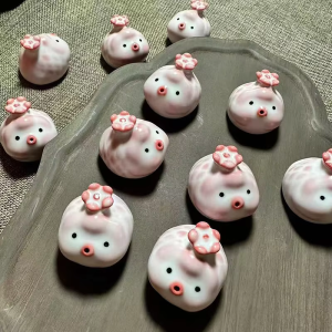 Schwein als Teetier aus Keramik mit Blume