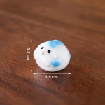 Schwein als Teetier aus Keramik mit Blume — Weiß mit hellblauen Flecken
