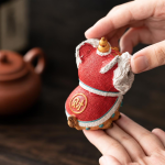 Tanzender Löwe als thermochromisches Teetier aus Kunstharz
