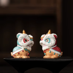 Tanzender Löwe als thermochromisches Teetier aus Kunstharz