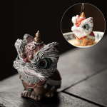 Tanzender Löwe als thermochromisches Teetier aus Kunstharz — Bordeaux und Gold