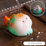 Tea Pet Fisch aus Kunstharz mit Farbwechsel — Rund in Orange und Türkis