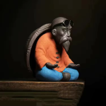 Tea Pet Schildkrötenfigur mit altem Mann — Orange