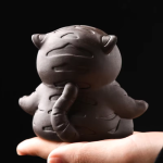 Tea Pet Tiger aus violettem Ton in vier Posen