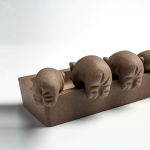 Tea Pet vier Schweine aus violettem Ton