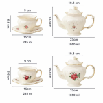 Teekanne oder Porzellantasse mit Untertasse im Blumenmotiv