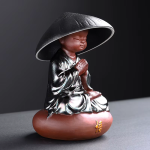 Teekannen-Deckelhalter Gongfu-Teesieb aus Porzellan — Sitzendes Kind in Schwarz