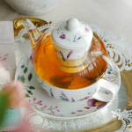 Teeservice mit Glasteekanne und blauem Hasenmotiv