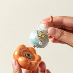 Teetier in Kürbisform mit Kristallglasur