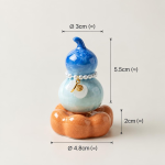 Teetier in Kürbisform mit Kristallglasur — Leuchtend blau, orangefarbener Sockel