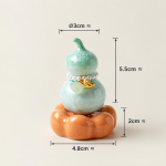 Teetier in Kürbisform mit Kristallglasur — Mintgrün, orangefarbener Sockel