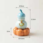 Teetier in Kürbisform mit Kristallglasur — Türkis, orangefarbener Sockel