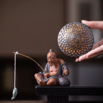Teetier Jiang Taigong und Teesieb aus violettem Ton